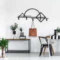 Garderobenleiste Geometrie aus Metall – minimalistische Linienform mit Haken