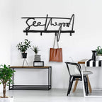 Garderobenleiste „See The Good“ aus Metall – Schriftzug mit Haken, 60 × 30 cm